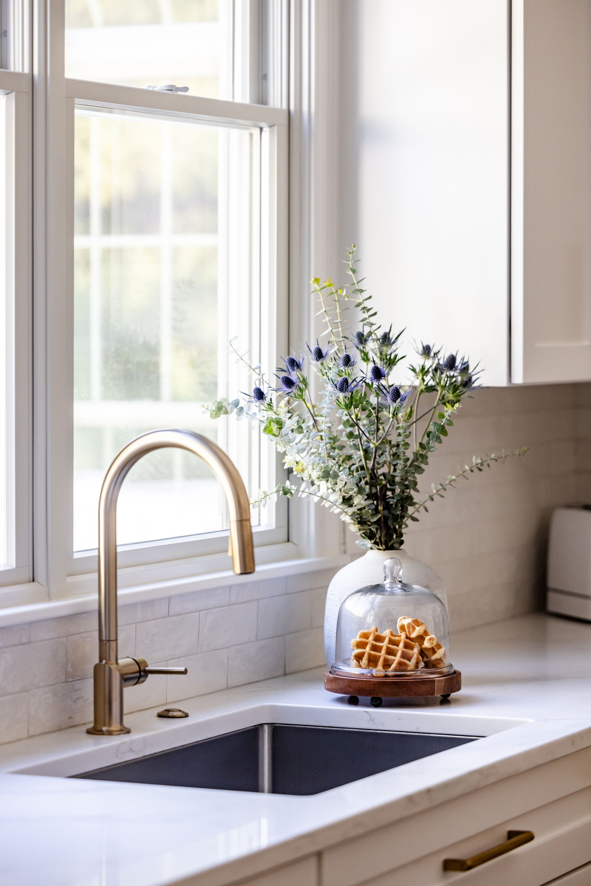 Sink under the window in morning light