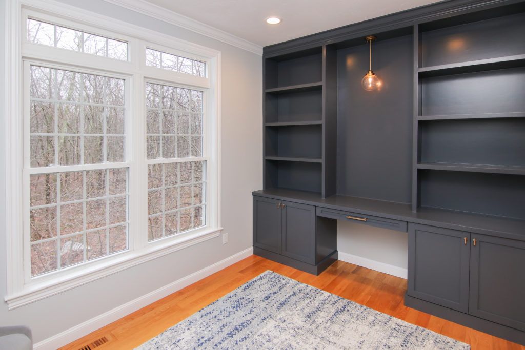 custom cabinetry work space sprayed with our cabinet painting technique