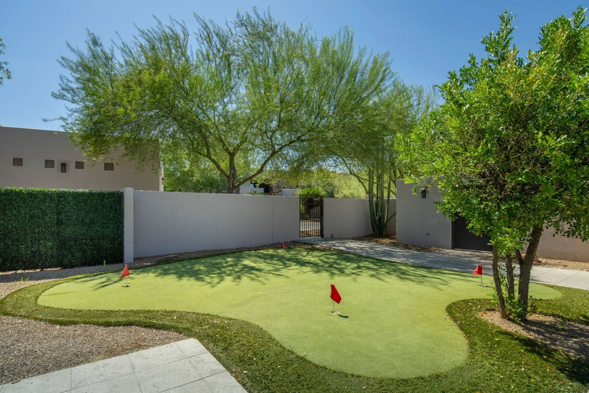 Putting green with red flags