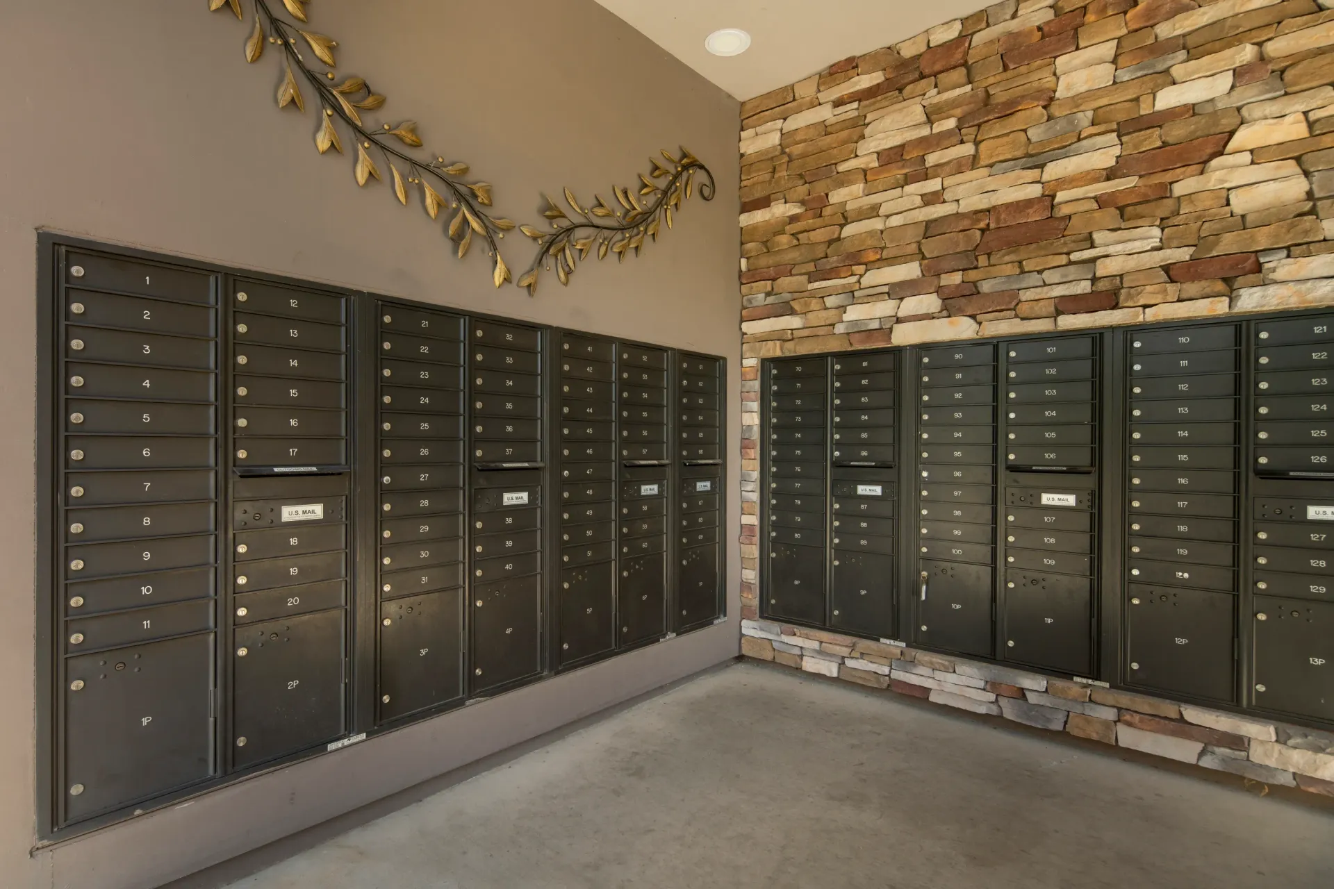 Mailboxes with numbers and U.S. Mail slots