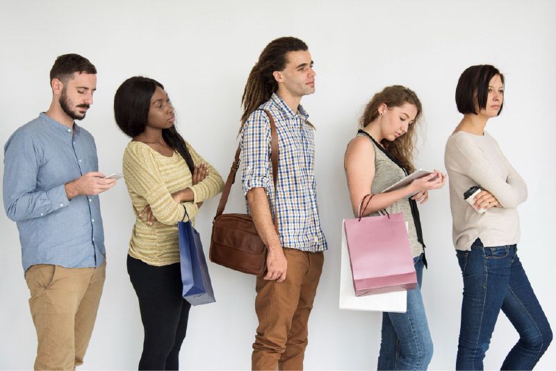 Five people standing in line