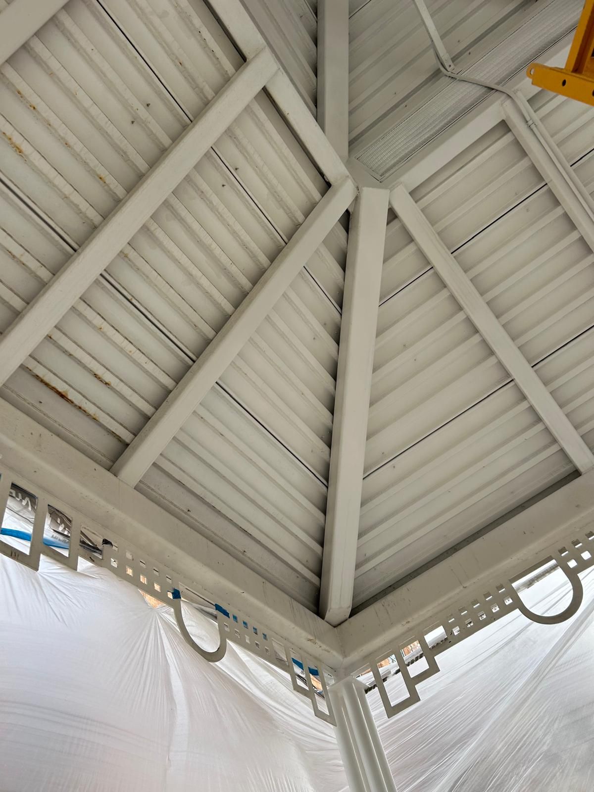 Looking up at the ceiling of a gazebo