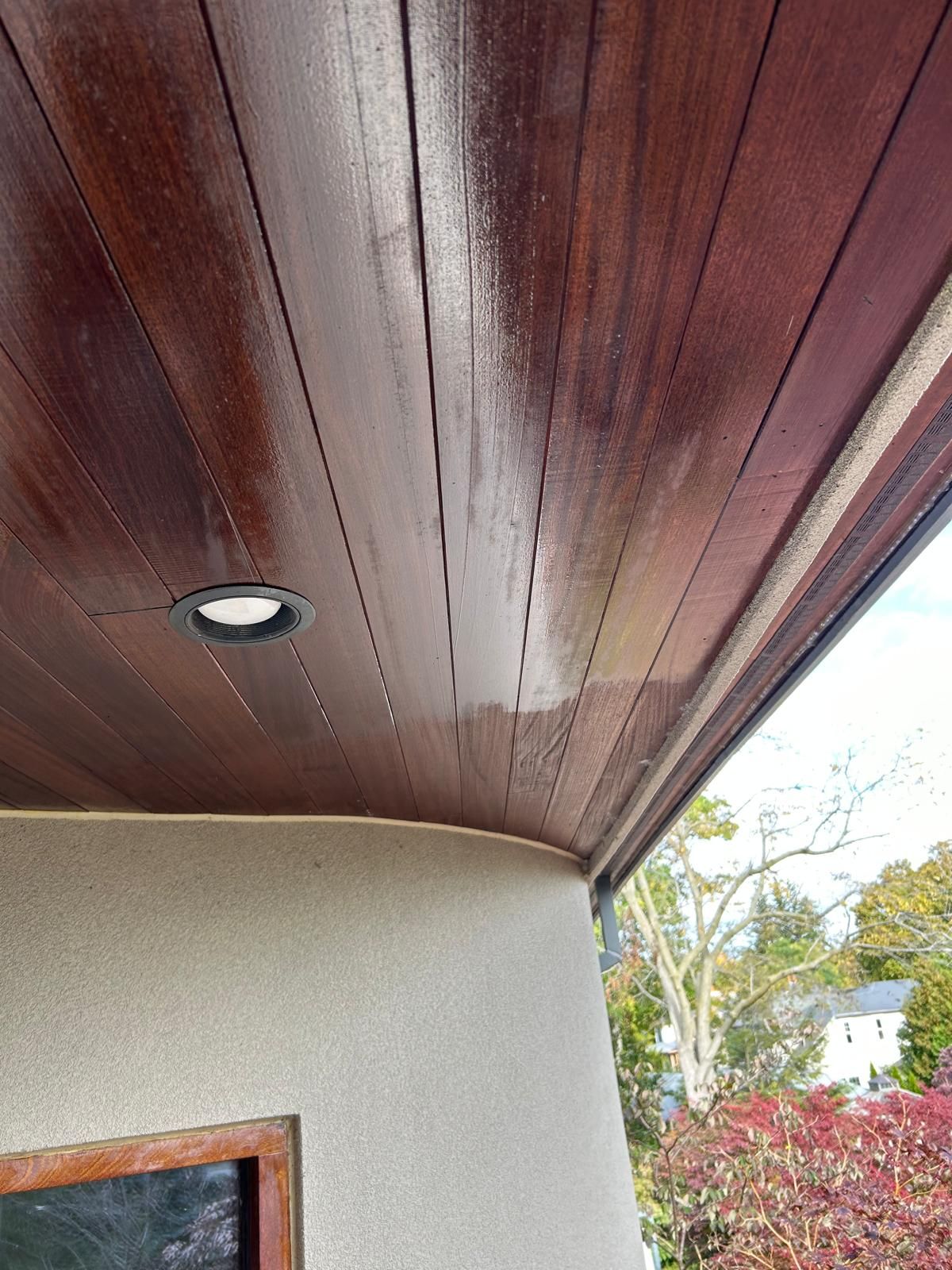 A close up of a wooden ceiling on a house.