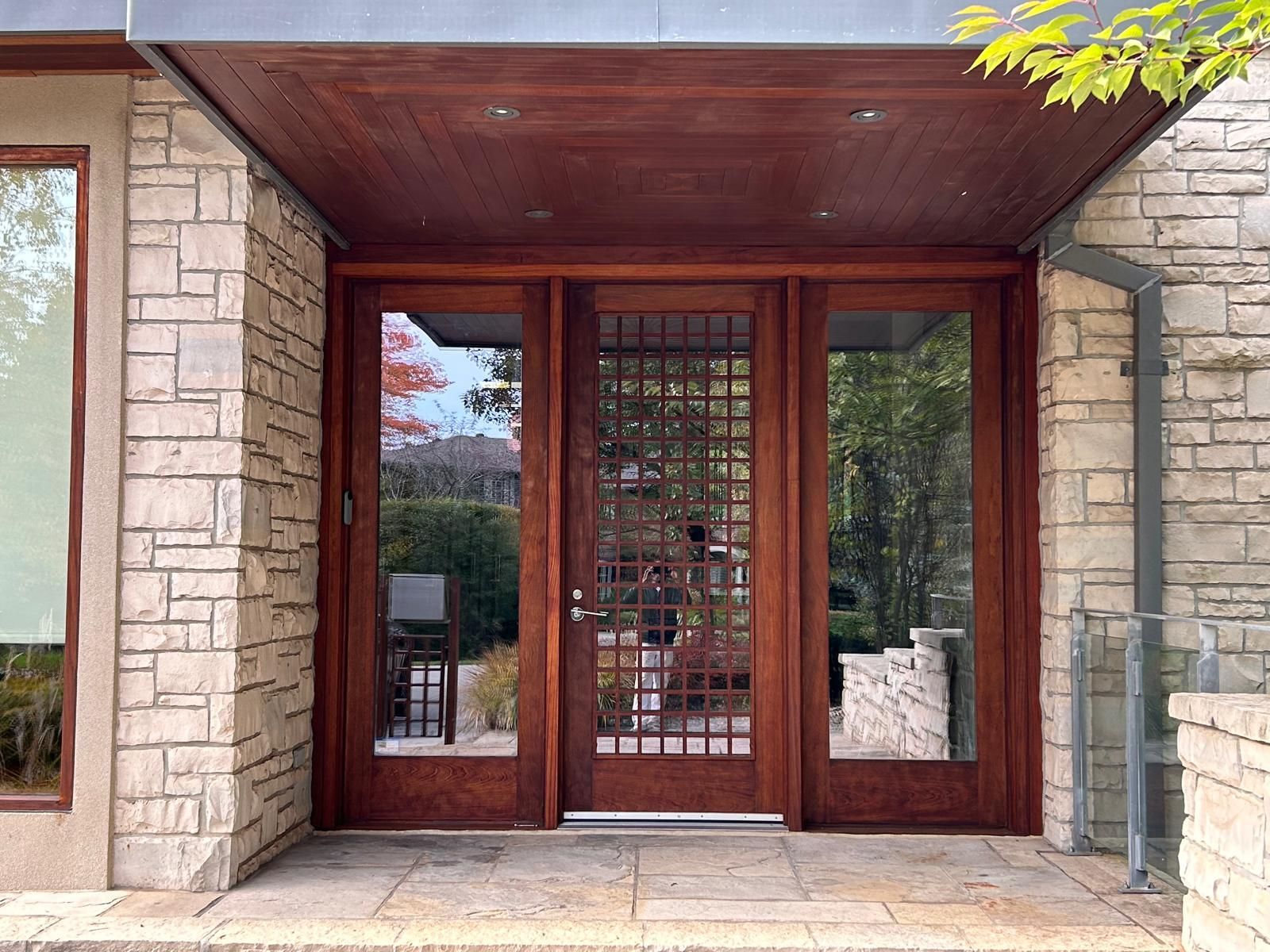 A brick building with a large wooden door
