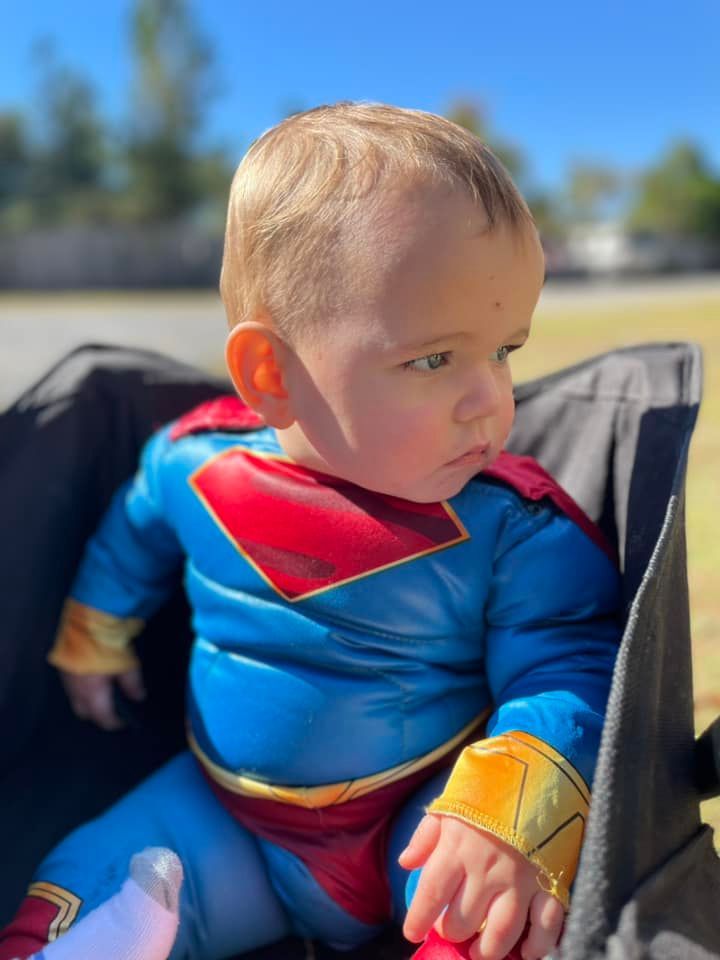 boy with superman outfit