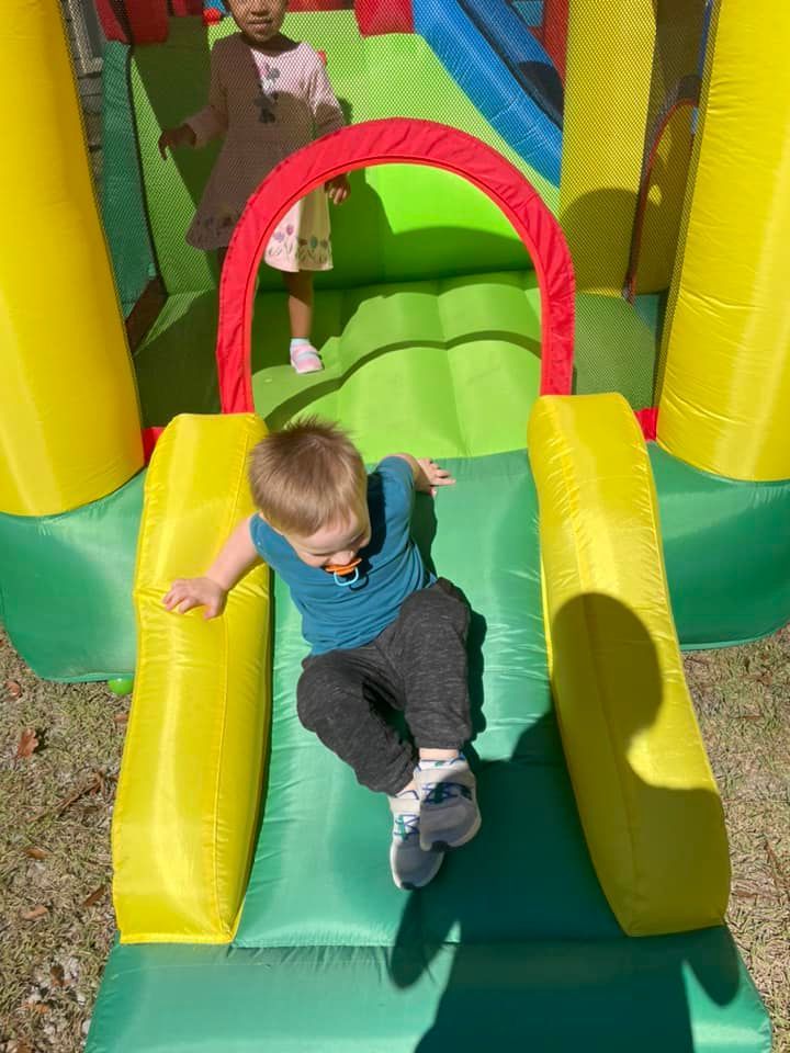 kid on slide