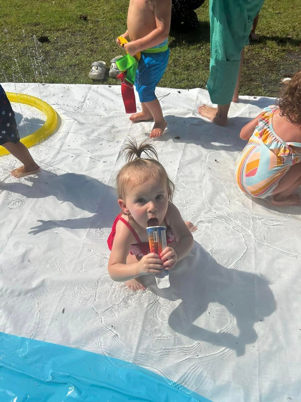 day care kid with ice cream outside