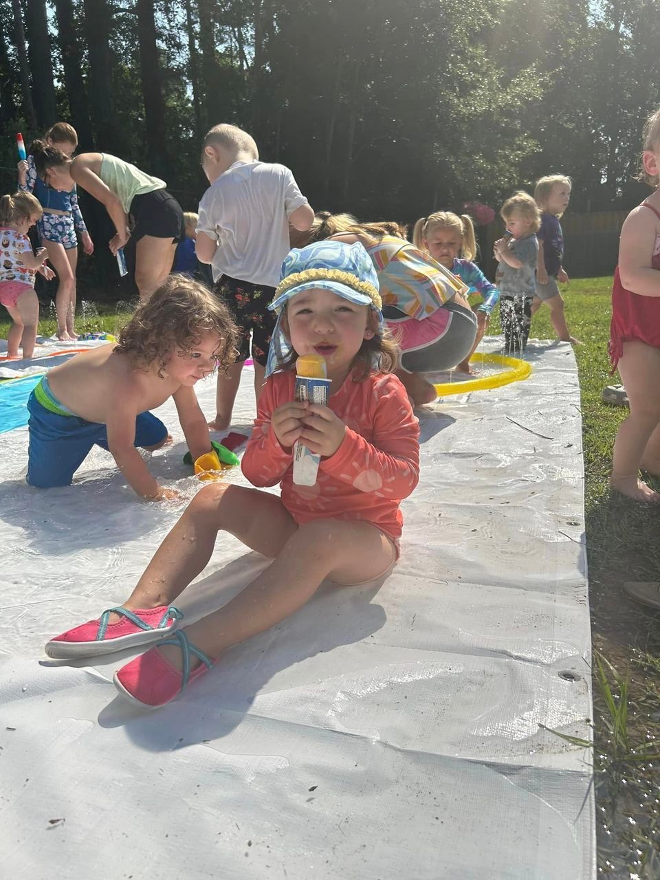 day care kid with ice cream outside