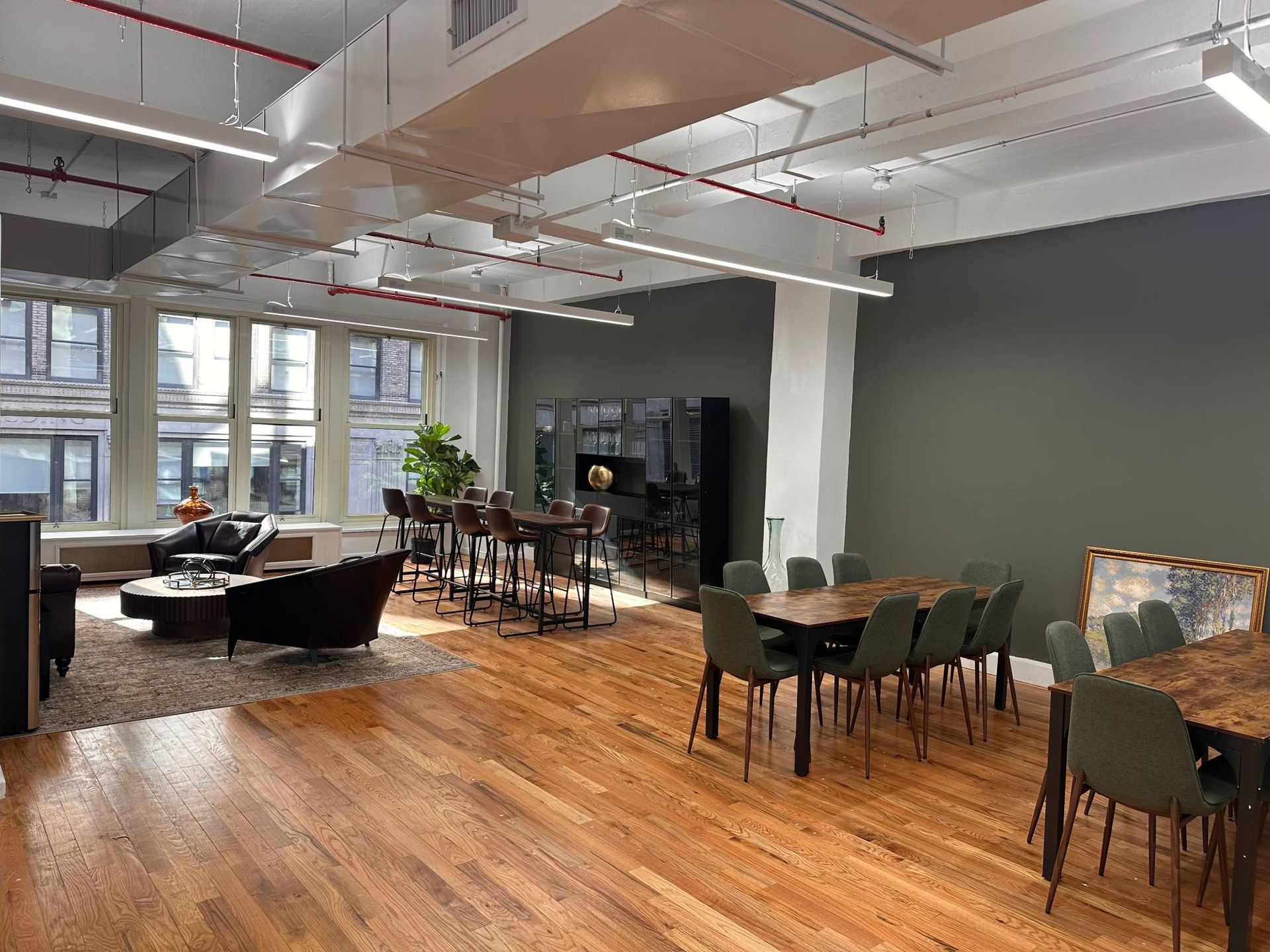 A large room with tables and chairs in it