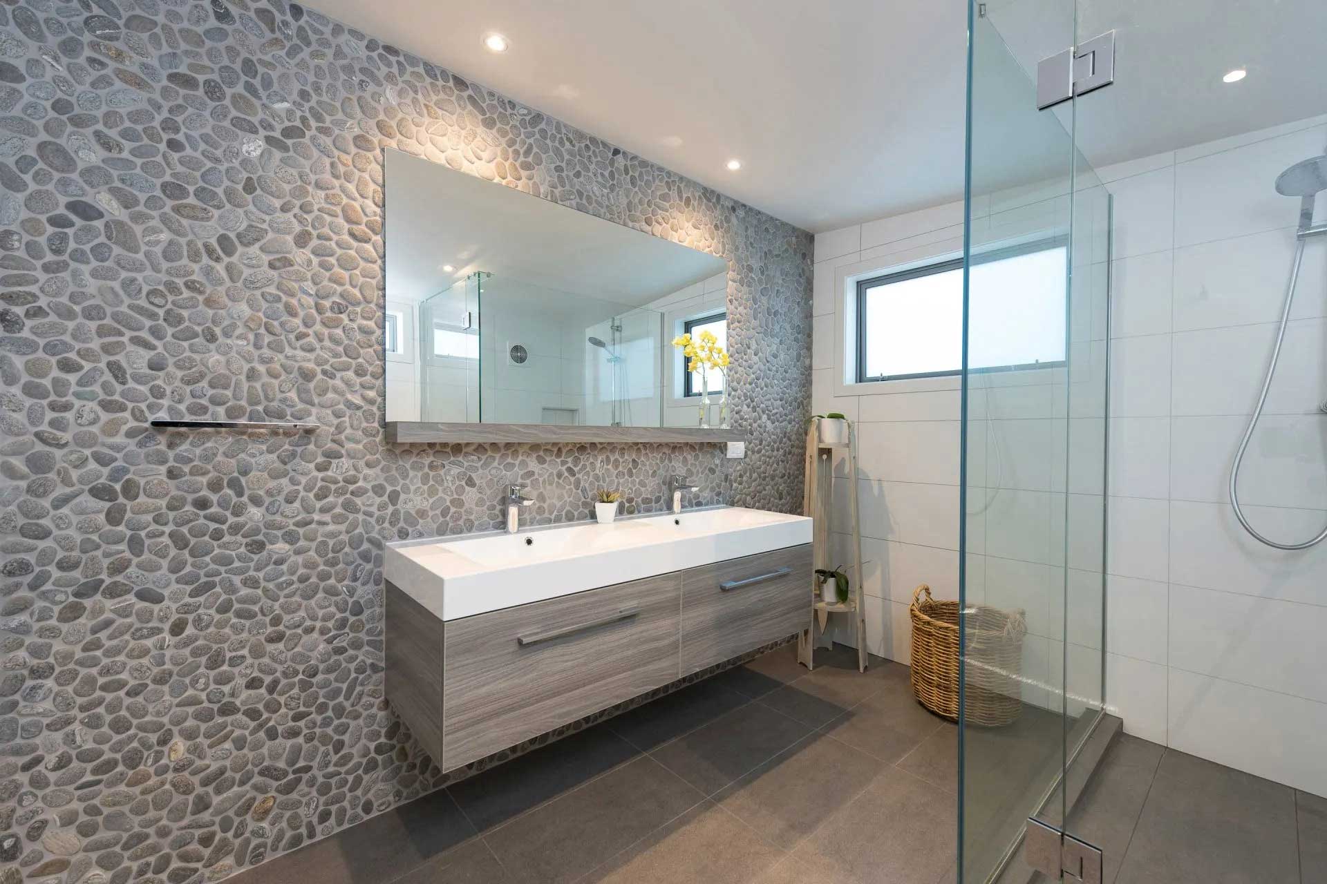 Pebble Wall of Bathroom — Kauai, HI — Pacific Tile Imports