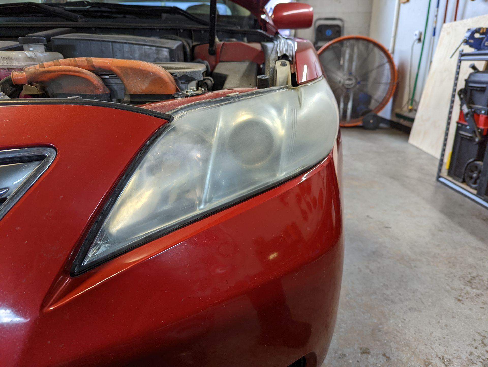 Before headlight restoration service in Edmond, OK
