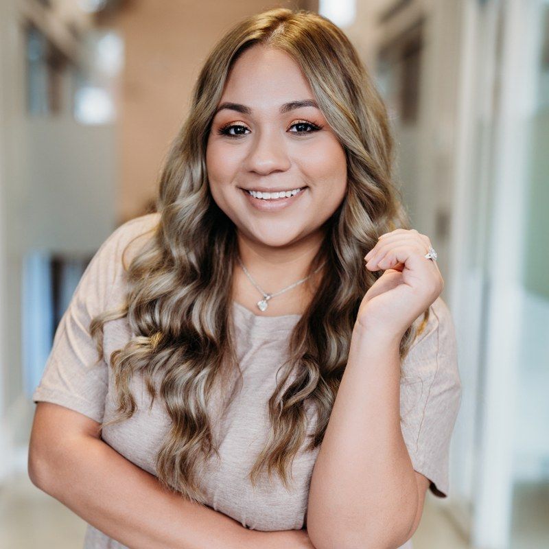 Headshot of Nayeli Flores, Site Director at Baker & Glover