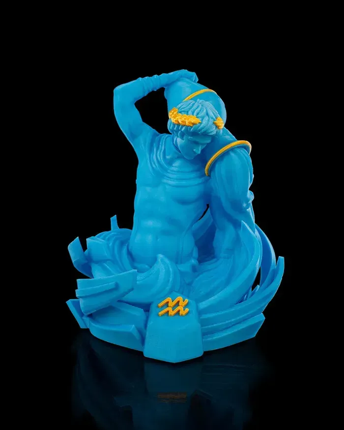 A blue statue of an aquarius zodiac sign