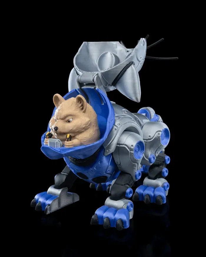 A robotic cat is sitting on a black surface.
