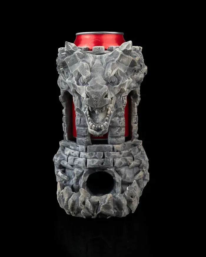 A can of soda is sitting inside of a statue of a dragon.