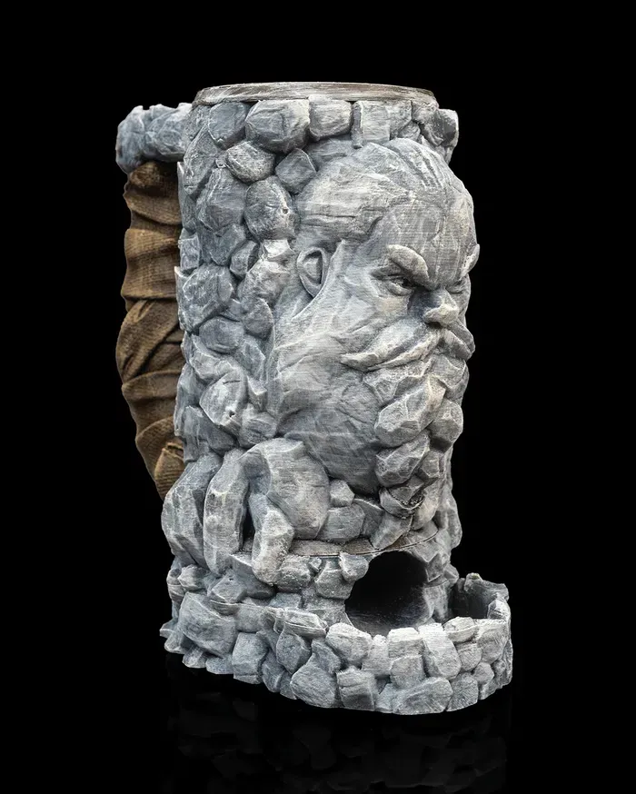 A statue of a man with a beard is holding a can of soda.