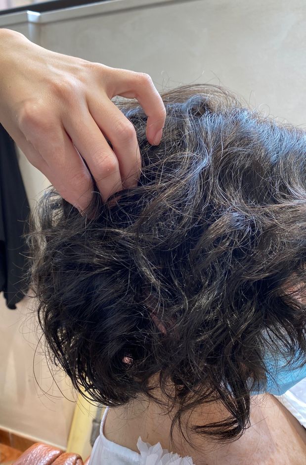 piega parrucca capelli corti veri