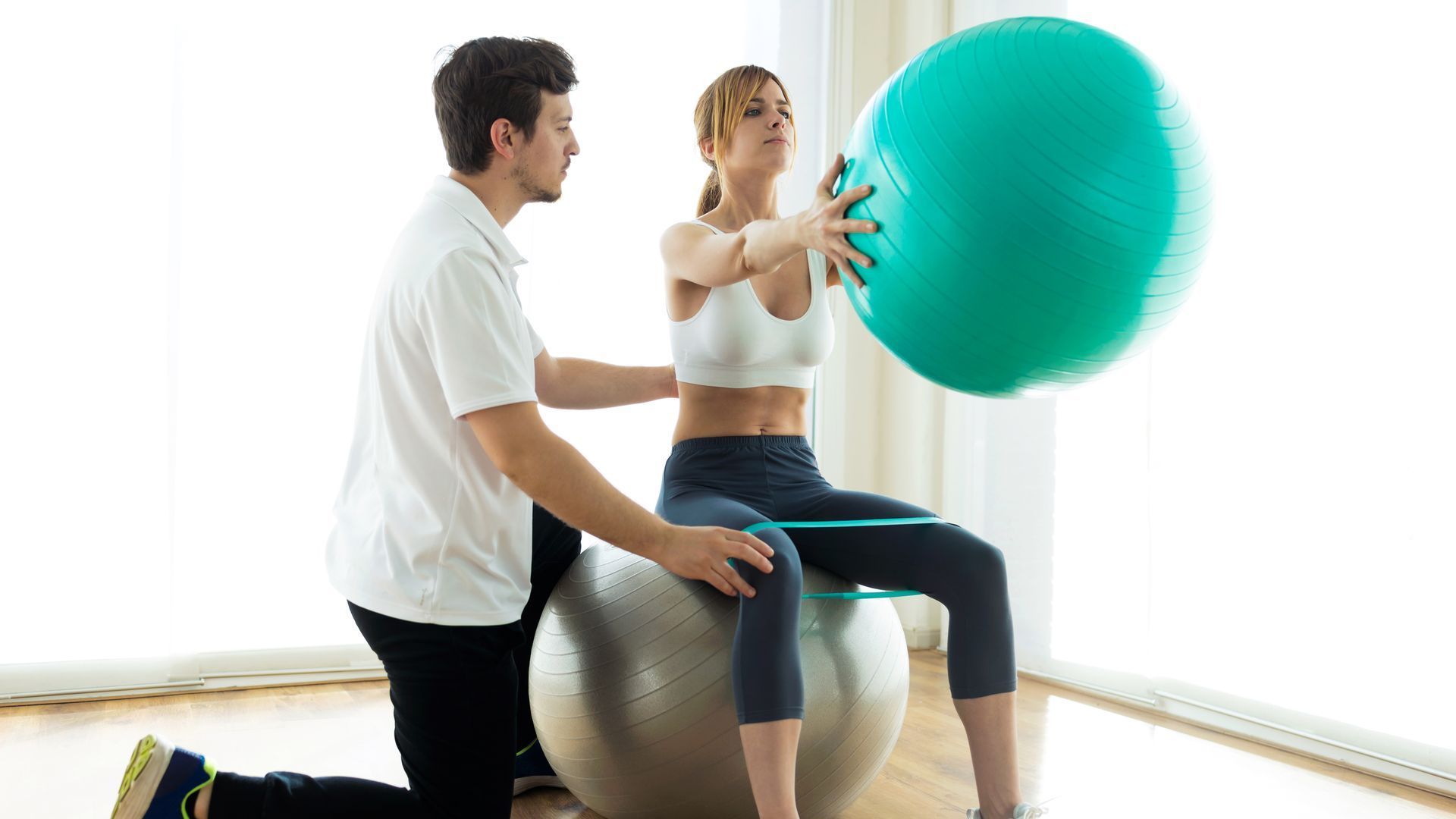 Woman going through physiotherapy exercises