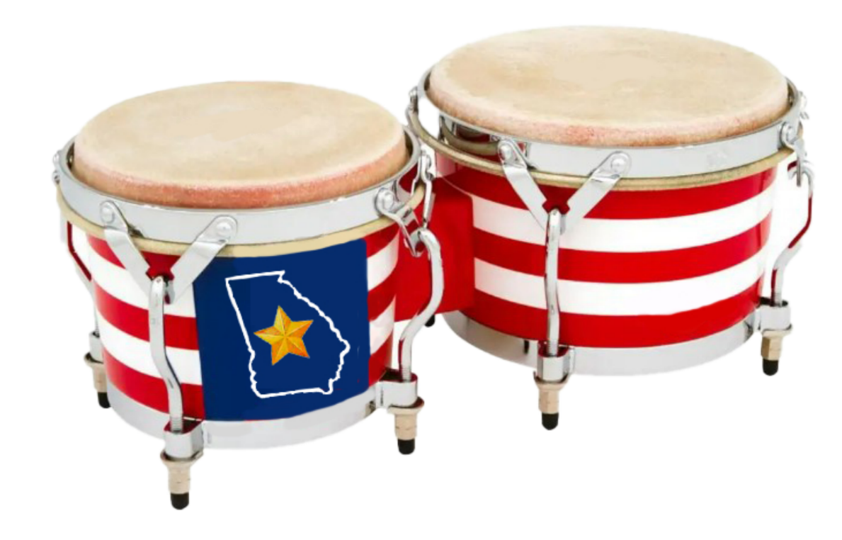 Two small striped drums with a blue Texas flag emblem on one drumhead