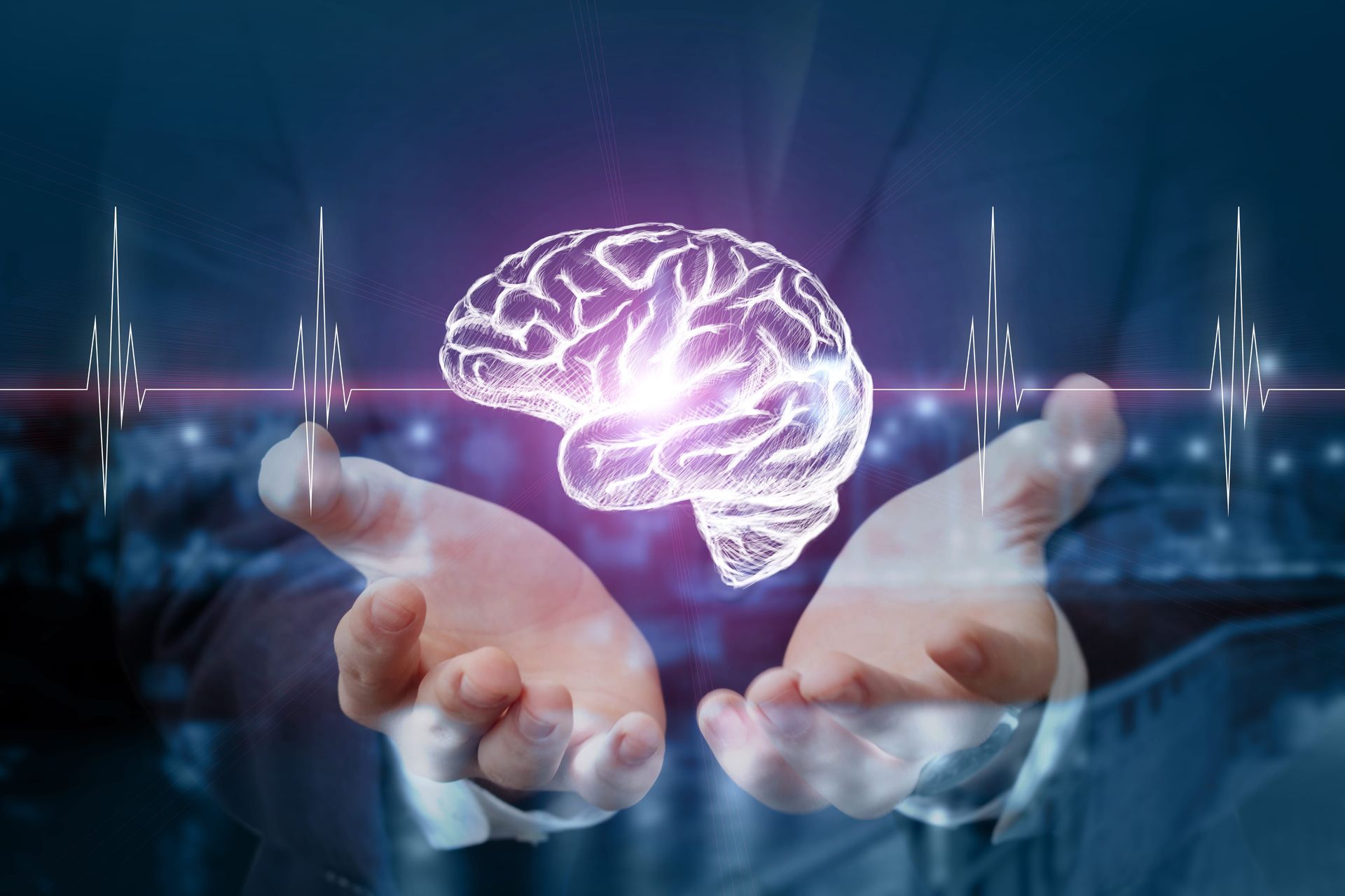 Glowing brain hovering above open hands against a dark blue digital background