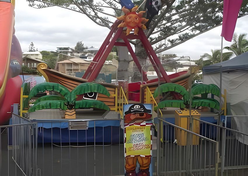 A Pirate Ship is Behind a Fence — Fun Time Amusements in Gracemere, QLD