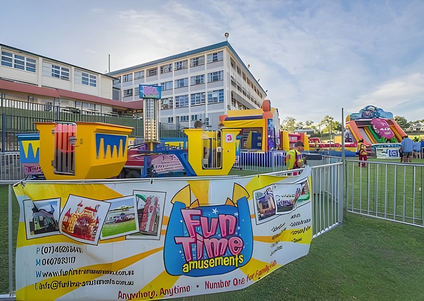 A Carnival With a Sign That Says Fun Time Amusements — Fun Time Amusements in Gracemere, QLD