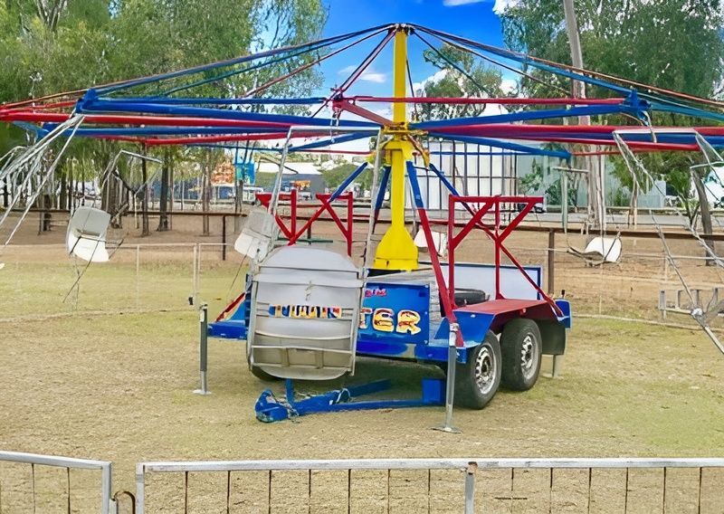 A Carnival Ride on a Trailer in a Field — Fun Time Amusements in Gracemere, QLD