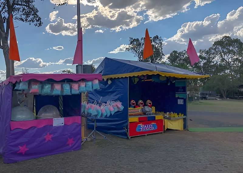 A Carnival Booth Selling Cotton Candy and Other Items — Fun Time Amusements in Gracemere, QLD