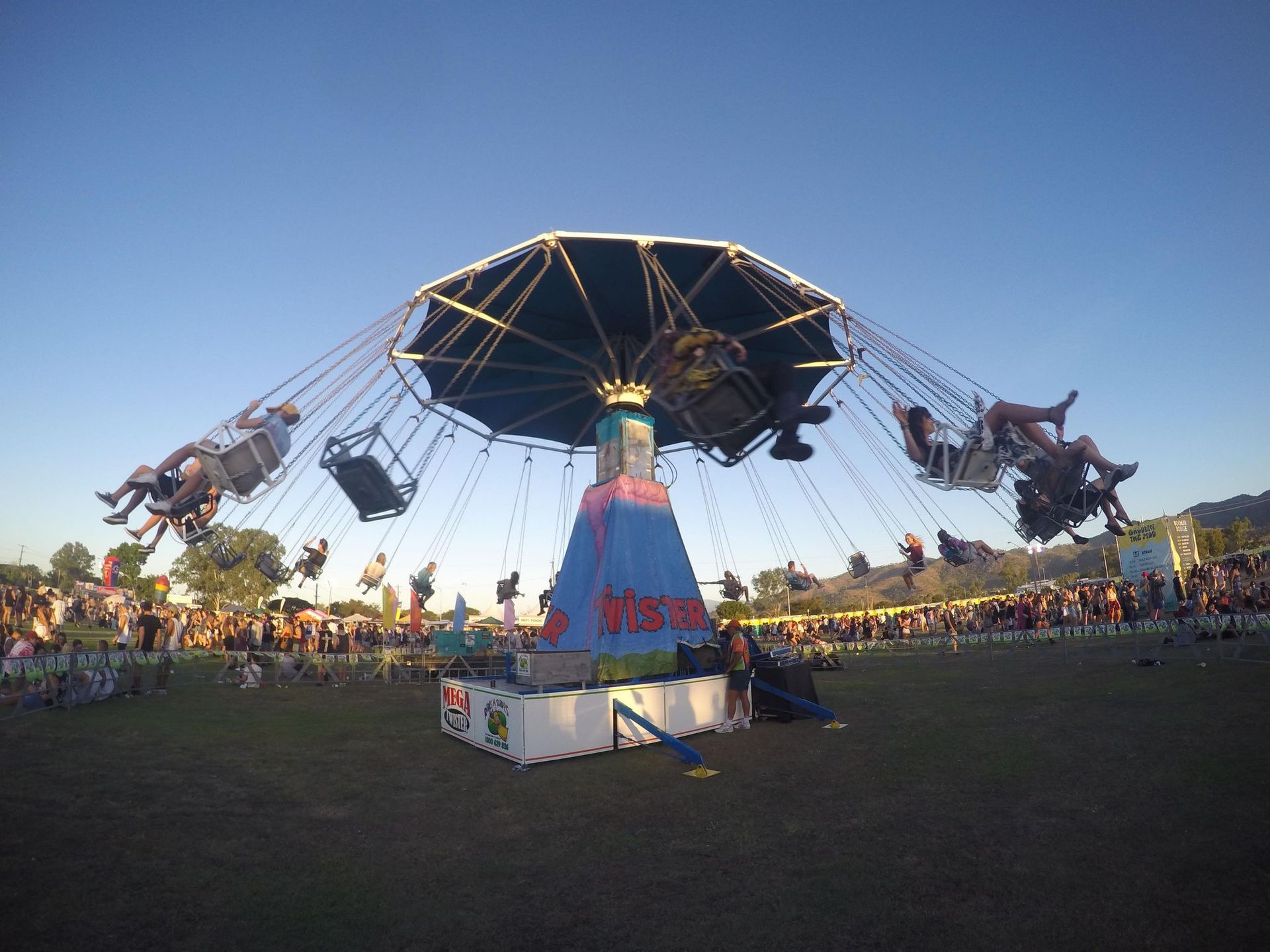 Nighttime Carnival With Ferris Wheel, Rides, and Colourful Lights — DNA Aquatics in Bundaberg, QLD