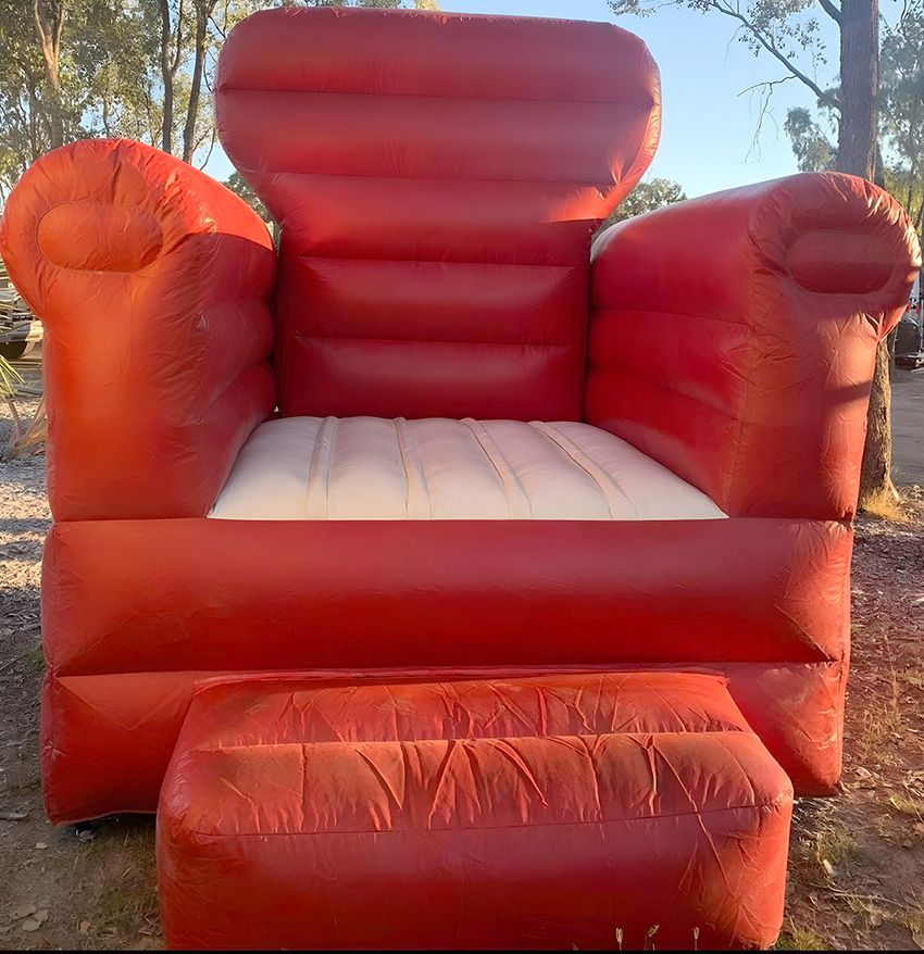 A Red Inflatable Chair — Fun Time Amusements in Gracemere, QLD