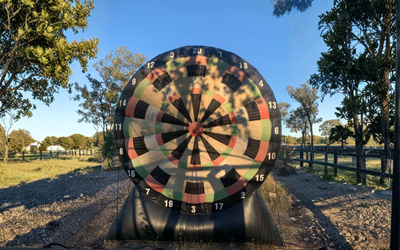 Inflatable Dartboard Game Outdoors With Trees — Fun Time Amusements in Gracemere, QLD