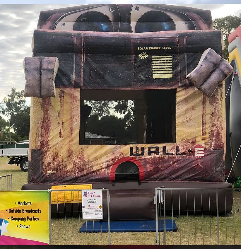 A Large Bouncy House With Wall-E Written on It — Fun Time Amusements in Gracemere, QLD