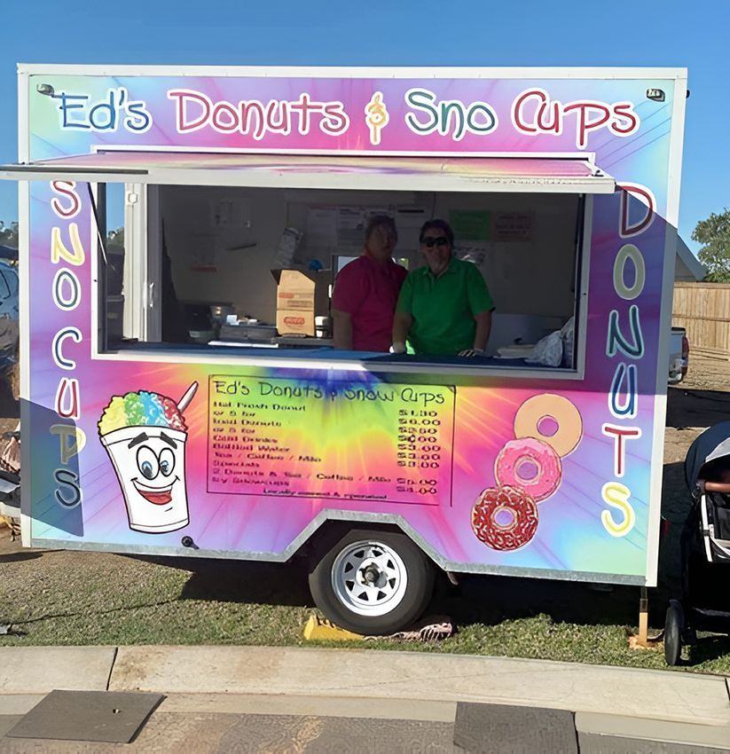 Ed's Donuts and Sno Cups is a Colourful Food Truck — Fun Time Amusements in Yeppoon, QLD