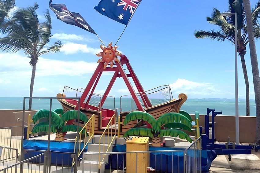 A Pirate Ship Ride With Flags Flying in the Wind — Fun Time Amusements in Gracemere, QLD