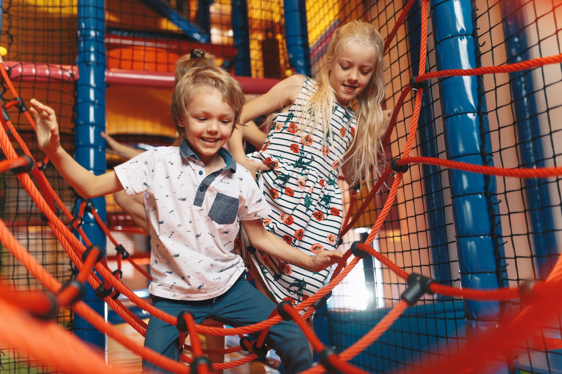 A Boy and a Girl Are Playing in a Bouncy House — Fun Time Amusements in Rockhampton, QLD