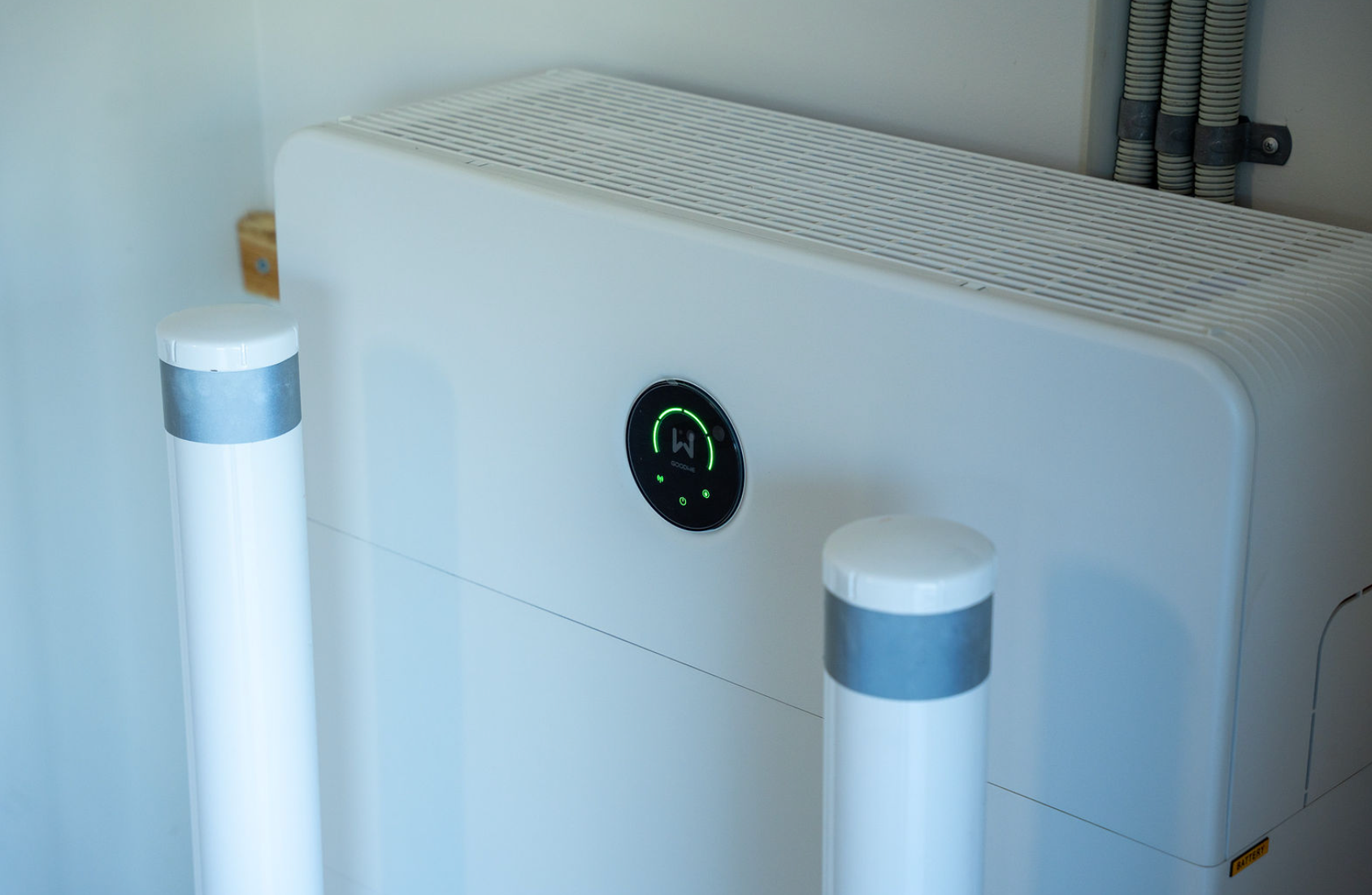 White Air Purifier With Two Glowing Uv-c Lamps and a Digital Display on Top — Local Light Electrical in Suffolk Park, NSW
