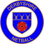 The logo for derbyshire netball is a blue circle with a red flower in the middle.