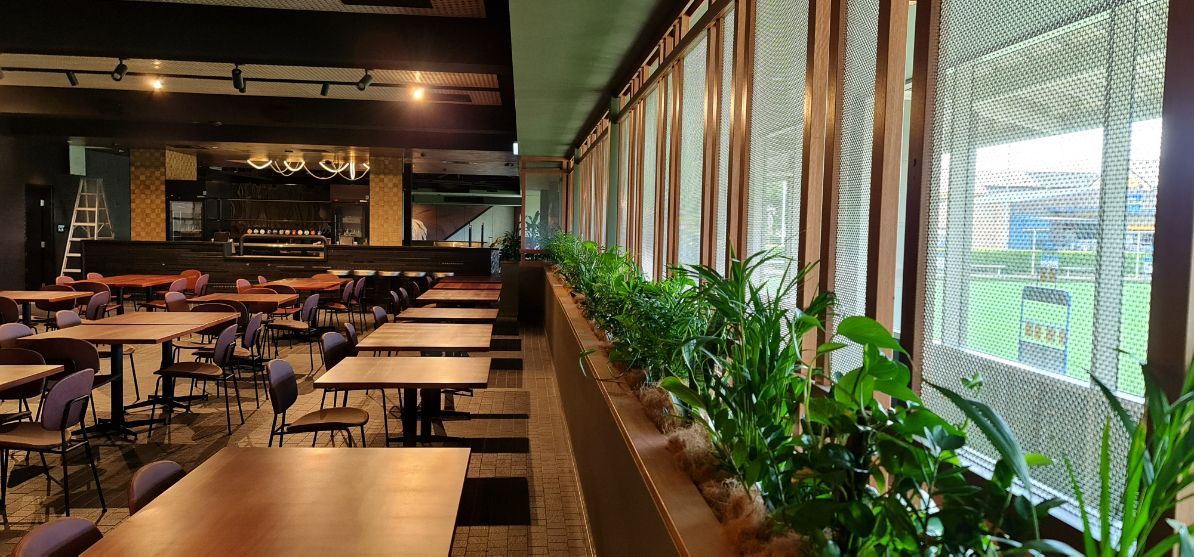 A Restaurant With Tables And Chairs And Lots Of Windows — Logic Joinery In Fountaindale, NSW