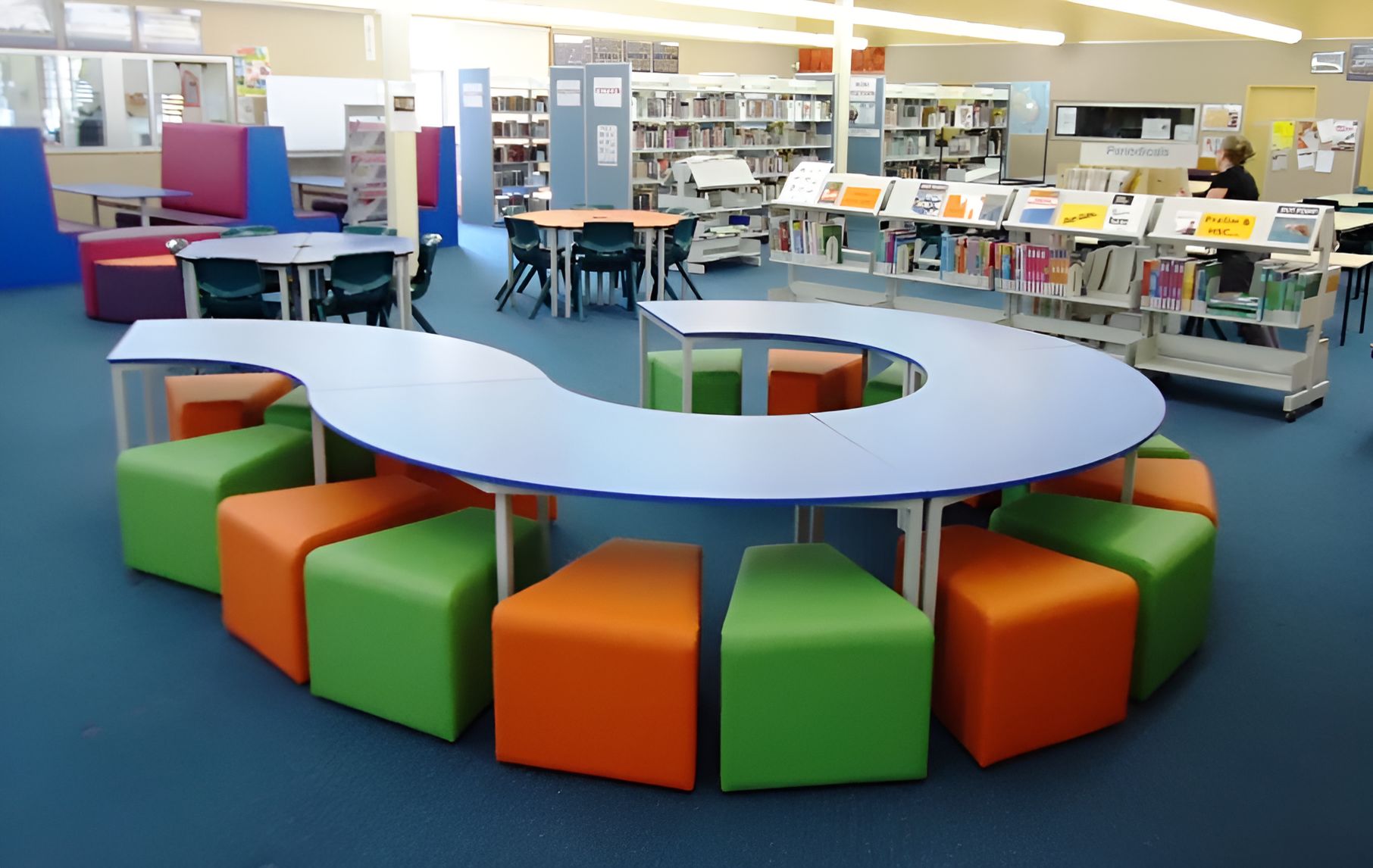 A Library With Tables And Stools In A Circle — Logic Joinery In Fountaindale, NSW