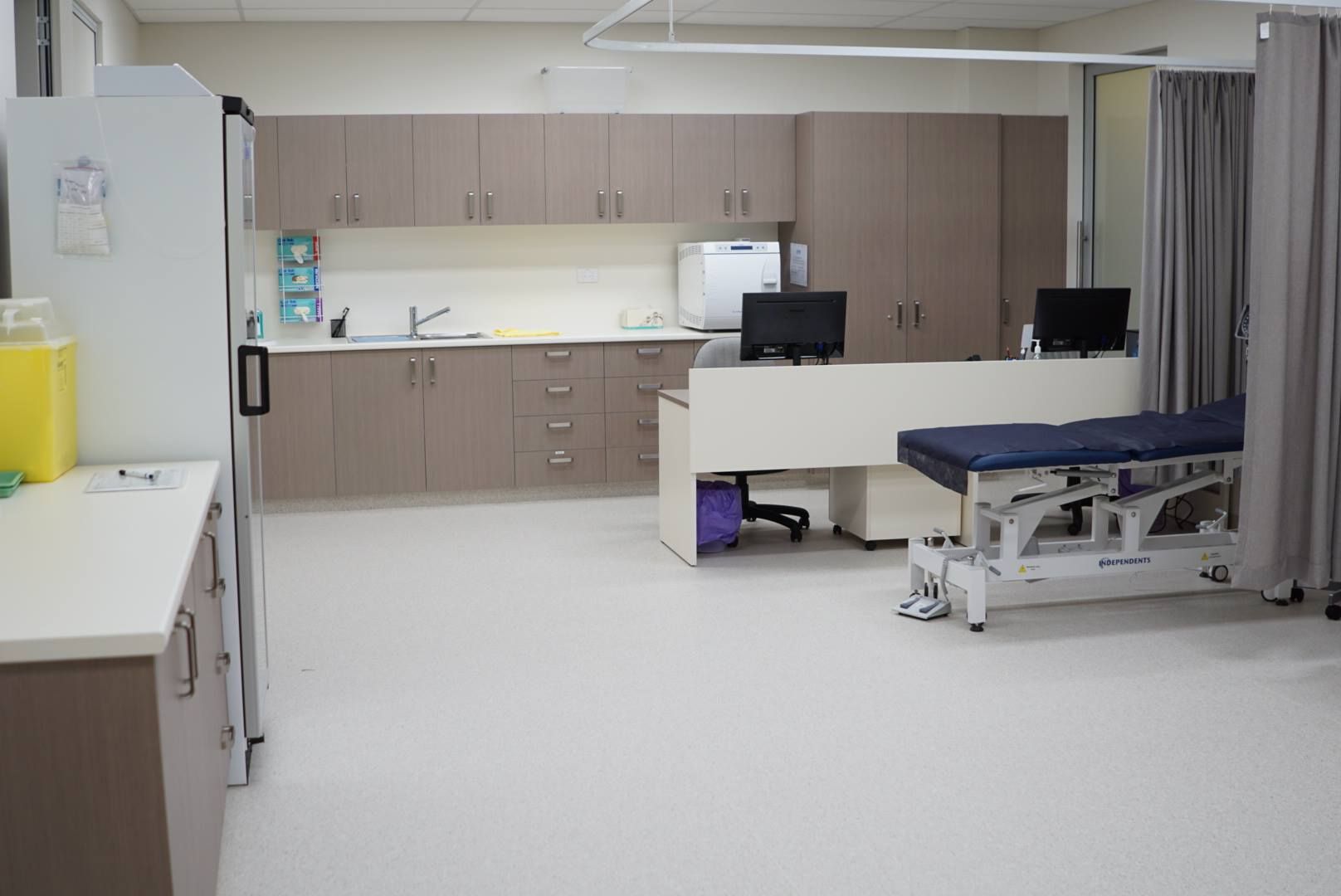 A Hospital Room With A Blue Table And A Counter — Logic Joinery In Fountaindale, NSW