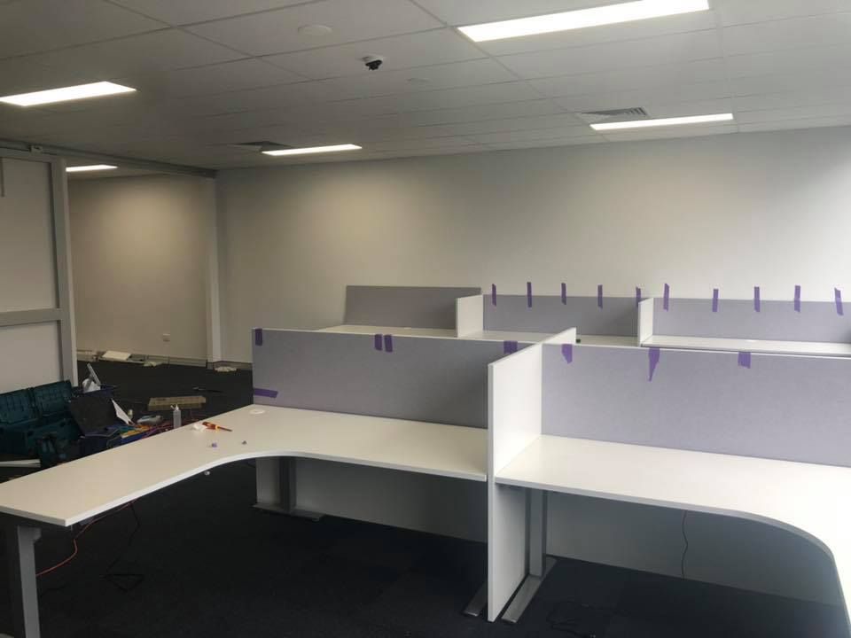 A Row Of Cubicles In An Office With Purple Dividers — Logic Joinery In Fountaindale, NSW