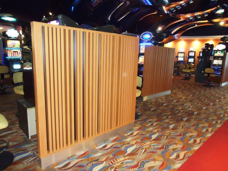 A Room In A Casino With A Wooden Divider And A Red Carpet — Logic Joinery In Fountaindale, NSW