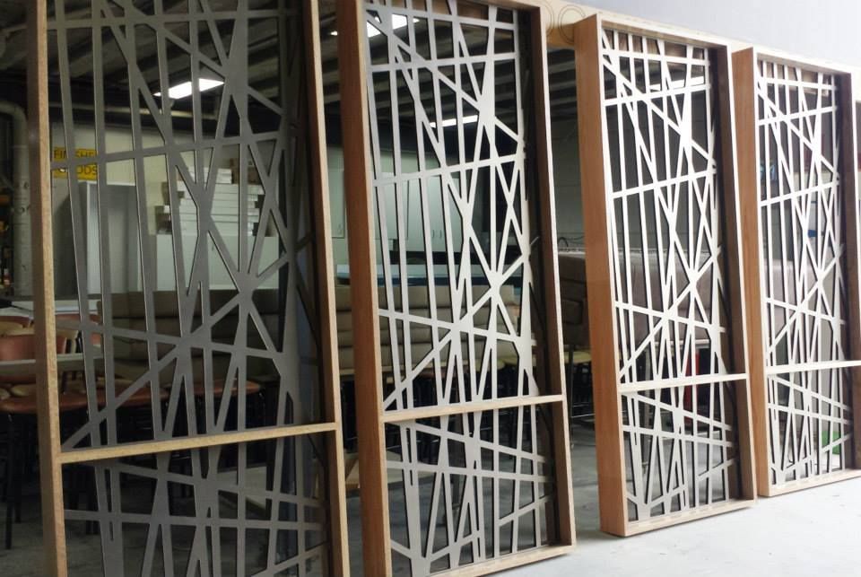 A Row Of Wooden Frames With A Pattern On Them Are Sitting Next To Each Other In A Room — Logic Joinery In Fountaindale, NSW