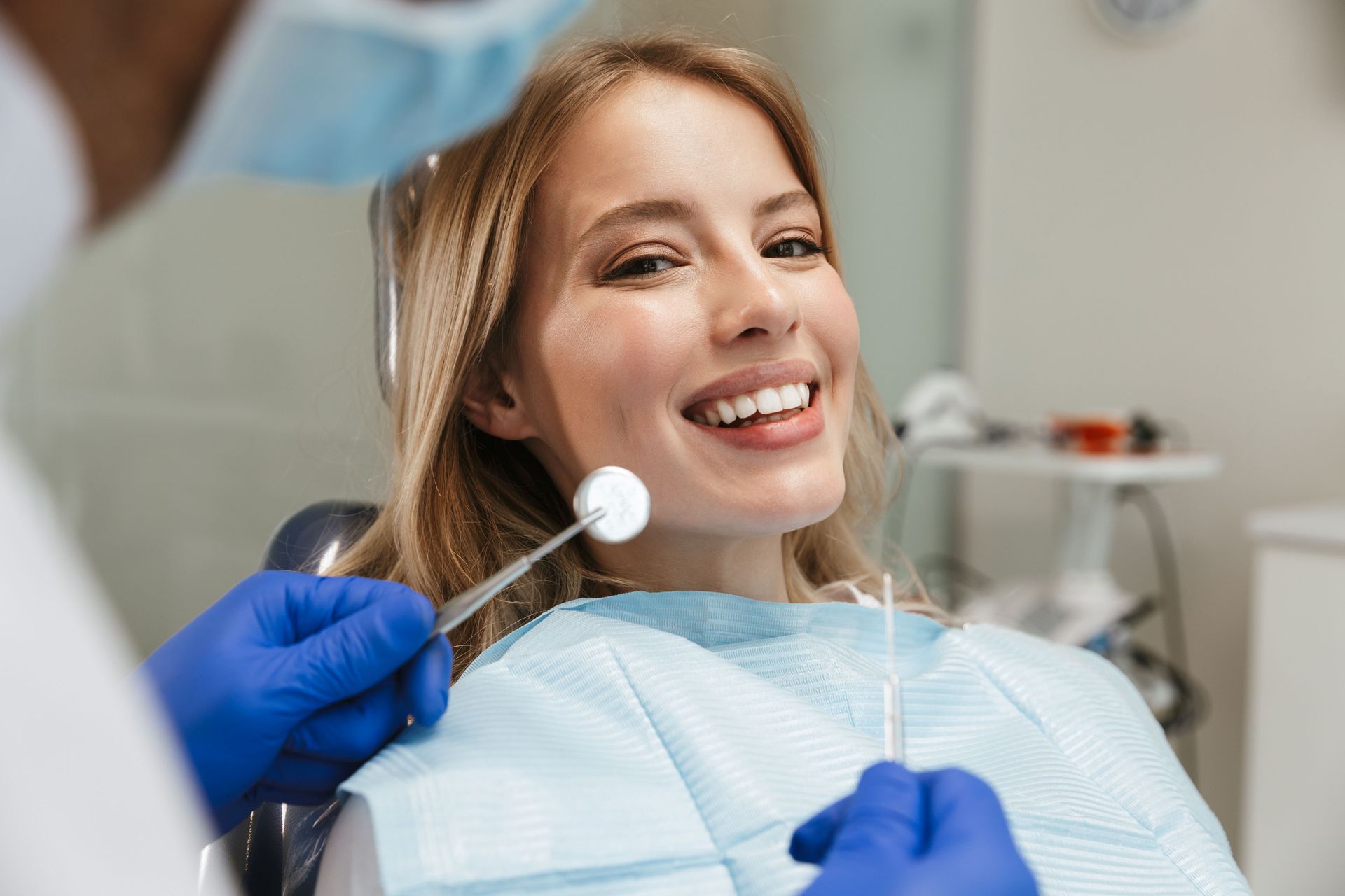 Dentist Examining a Patient