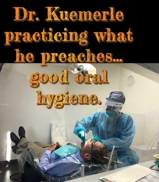 Dentist Examining Patient
