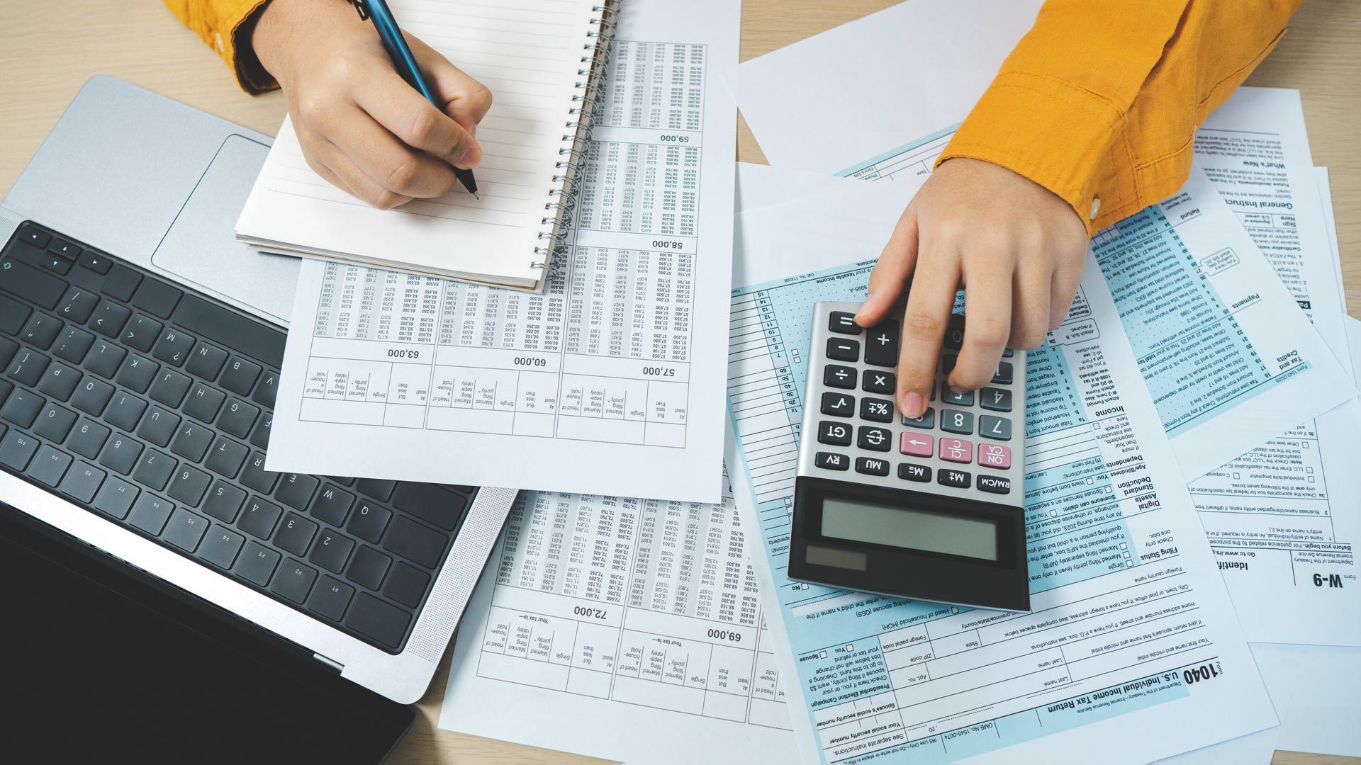 Top view of tax return preparation and financial management.