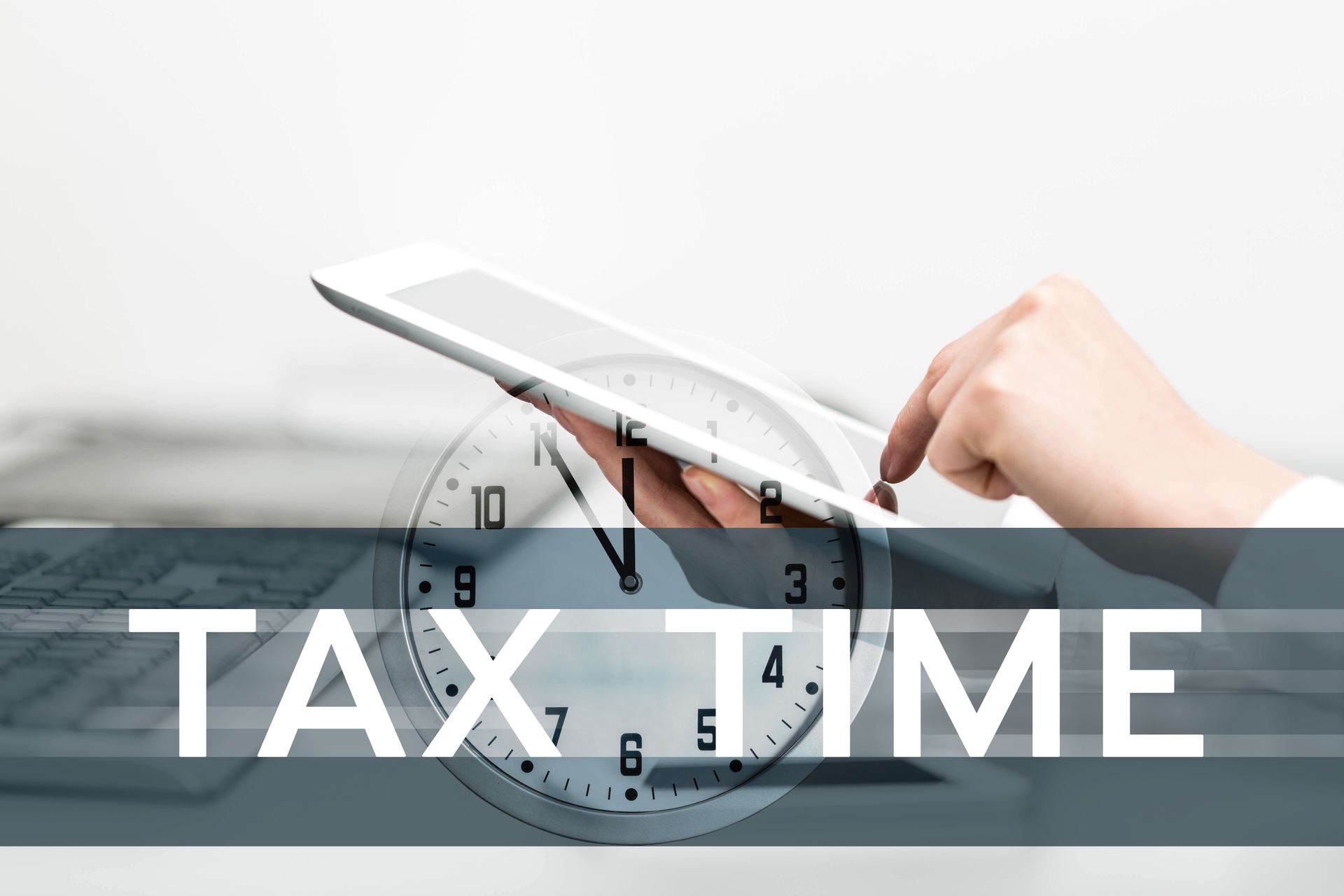 Hand using a tablet over a clock graphic illustrating tax time and deadlines. Hand using a tablet over a clock graphic illustrating tax time and deadlines.