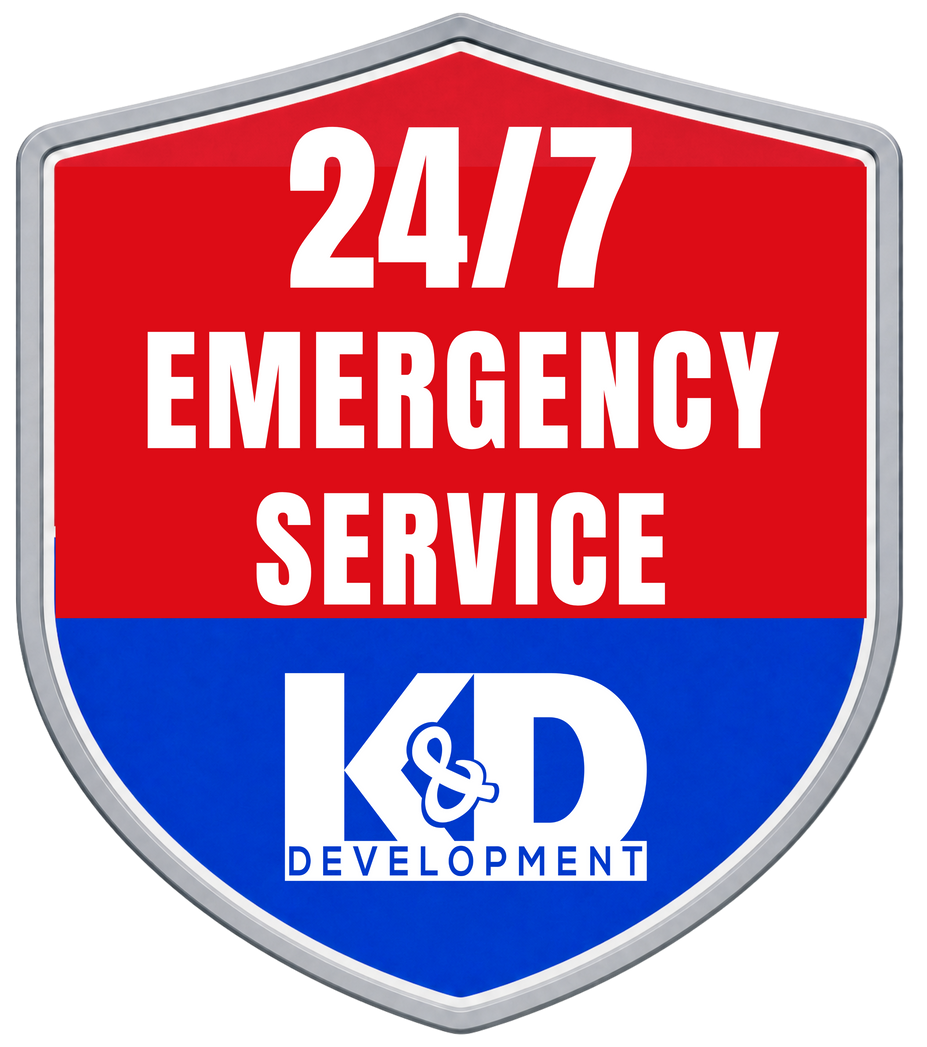 Red, white, and blue shield logo reading “24/7 Emergency Service” with KD Development at the bottom