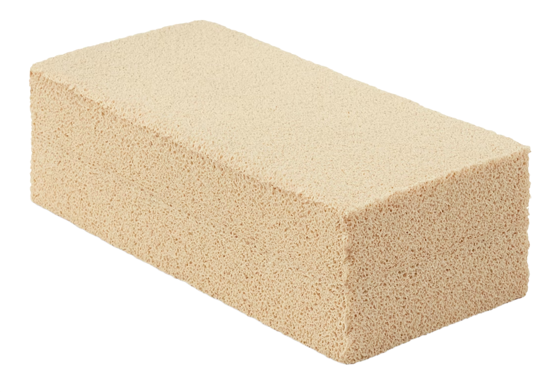 Beige rectangular sponge or foam block on a white background