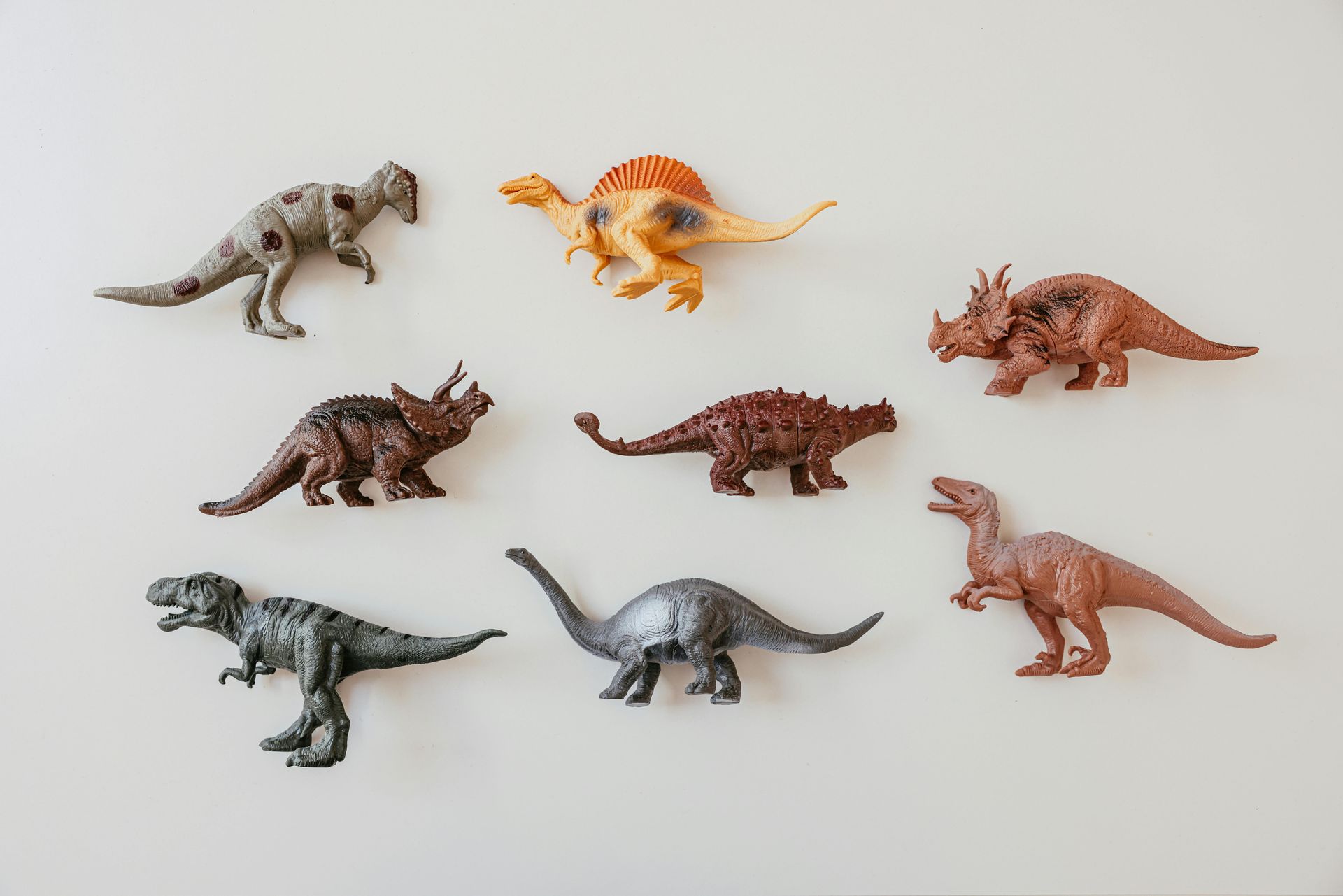 Children participating in dinosaur-themed autism and neuro affirming social skills programming during a respite session